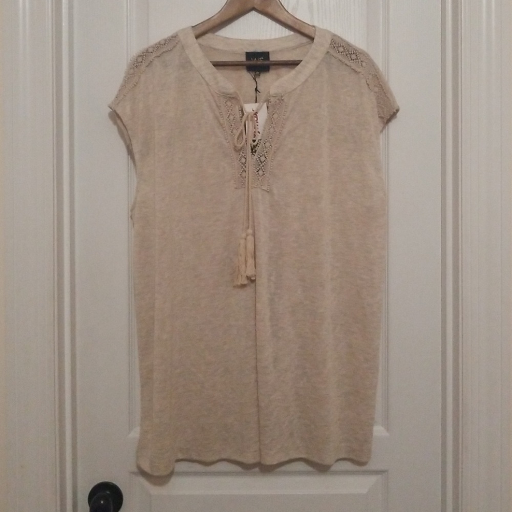 Sleeveless cream top